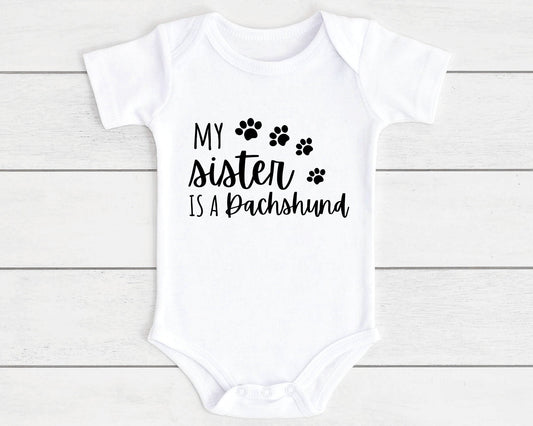 Baby Vest Gift Vest Funny Brother Is A Dog Breed Dachshund, Cockapoo, Labrador, Pug Etc | Customise With Any Breed